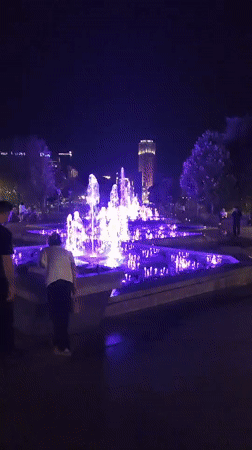 Colorful fountain lights up Yerevan public square at night
