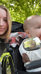 Mother films casual park outing with baby in Donetsk