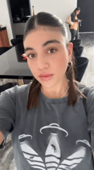 Woman takes selfies indoors in Puebla City