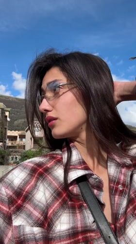 Woman photographed multiple times in Sutomore, Montenegro