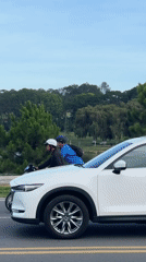 Masked pedestrian spotted near lakeside road in Da Lat