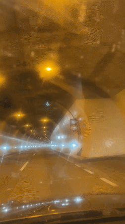 Vehicle passes through illuminated tunnel in Bátaszék, Hungary