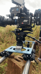Film crew operates professional ARRI camera on set