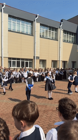 School children perform dance for audience in Birobidzhan