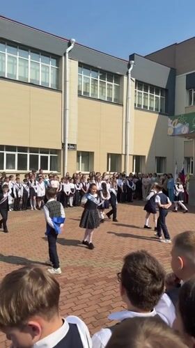 School children perform dance for audience in Birobidzhan