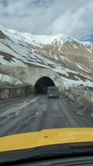 Driver follows van through Georgian mountains, enters tunnel