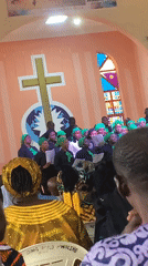 Sunday service at a Jos church, choir in green and black