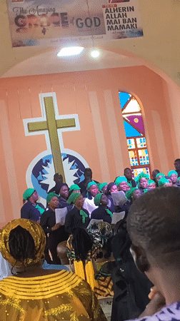 Sunday service at a Jos church, choir in green and black
