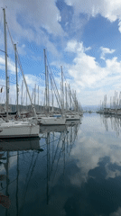 Tourist captures morning views of sailboat marina in Fethiye, Turkey