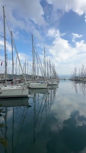 Tourist captures morning views of sailboat marina in Fethiye, Turkey
