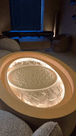Tea service and sand art table captured at Khimki establishment