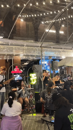Band performs outdoor concert in Chiang Mai entertainment district