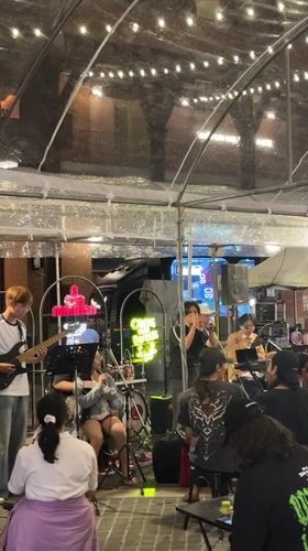 Band performs outdoor concert in Chiang Mai entertainment district