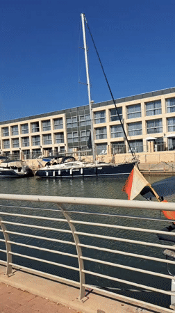 Morning at Herzliya Marina, boats docked on a calm clear day