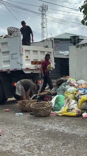 Late-night waste collection and earthquake alerts documented in Davao City