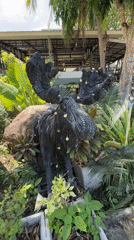 Animal sculptures spotted in Thai garden setting