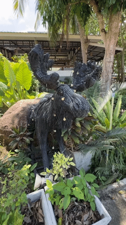 Animal sculptures spotted in Thai garden setting