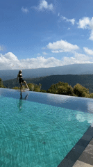 Tourist documents farm visit with animals, swimming, painting in Indonesia