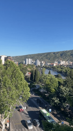 Afternoon cafe visit documented with city views in Tbilisi