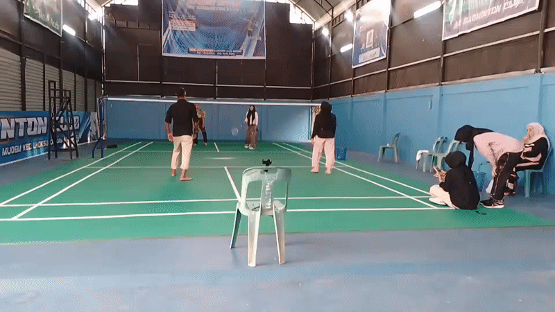 Badminton session in full swing at an indoor court in Aceh