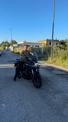 Motorcyclist spotted on street in Aprilia, Italy