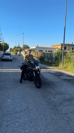 Motorcyclist spotted on street in Aprilia, Italy