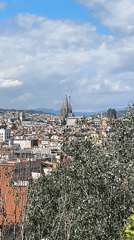 Aerial view captures Barcelona cityscape featuring Sagrada Familia basilica