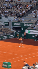Tennis matches and court maintenance at Roland Garros