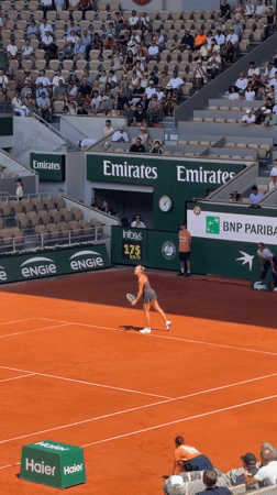 Tennis matches and court maintenance at Roland Garros