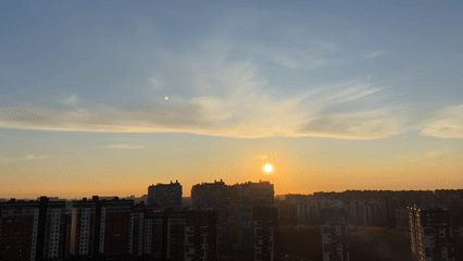 Golden hour moments captured in Russian city, peace sign shadow