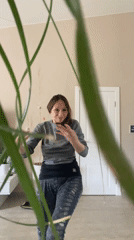 Woman dances at home in Krasnoyarsk apartment