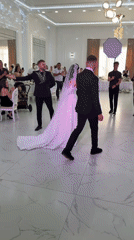 Wedding reception dancing in a bright hall, Mălăiești