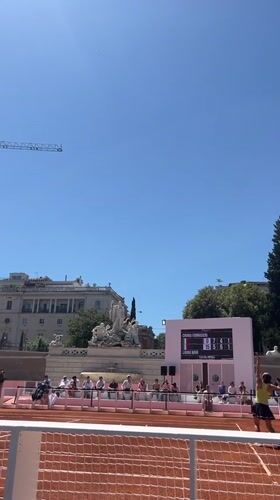 Tennis match held on temporary clay court at Rome's Piazza del Popolo