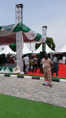 Outdoor media event with staged setup documented by witnesses