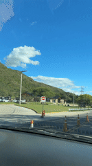 Driver records sunny road conditions in Villa General Belgrano