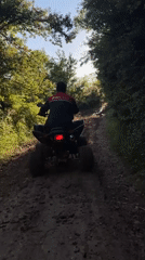 ATV adventure through woods, fields, and muddy terrain