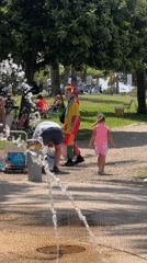 Man observed near trash bin at park fountain