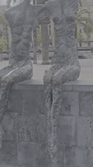 Afternoon stroll captures Barcelona's sculptures, harbor, and palm-lined streets