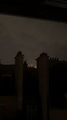 Paris rooftop views of Bastille Day eve fireworks