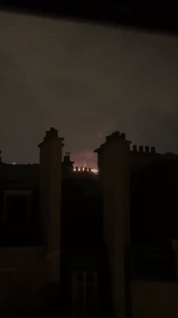 Paris rooftop views of Bastille Day eve fireworks