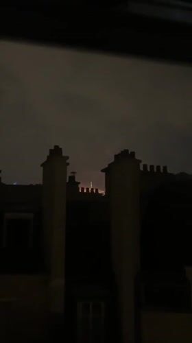 Paris rooftop views of Bastille Day eve fireworks
