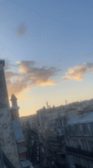Paris rooftops at sunset, shot from above