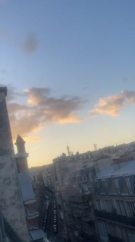 Paris rooftops at sunset, shot from above