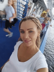 Boat deck selfies and urban street scenes on a cloudy afternoon