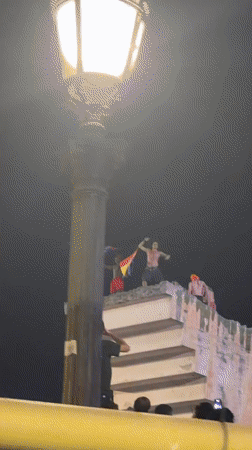 Barcelona erupts in late-night celebrations behind Spanish flag