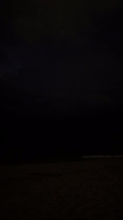 Nighttime flash observed over dark Choeng Thale beach, Thailand