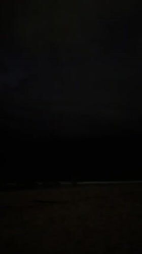 Nighttime flash observed over dark Choeng Thale beach, Thailand