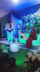 Traditional wedding ceremony features red-dressed bride, cultural customs, dancing