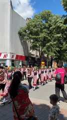 Folk costume parade winds through historic Plovdiv streets
