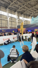 Indoor sporting event with children's race track held in Kazan